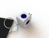 allocacoc PowerCube Original USB - Ladrón multiple con 4 enchufes 230 V y un puerto USB, en forma de cubo, (color blanco y azul)